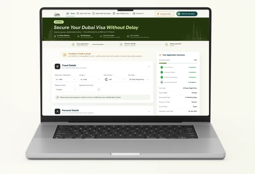Laptop showing the Dubai visa application form where you enter applicant details and upload documents